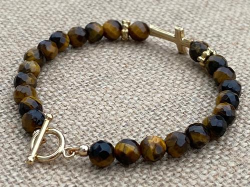 Faceted Yellow Tigereye Gemstone Bracelet with a Sideways Antique Replica Gold Cross and Beads Gold Bronze 7 and 1/4 inch long Toggle Clasp